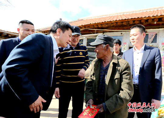 承德市残联理事长陈志民一同参加慰问。